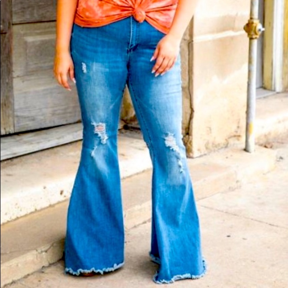 Mid wash extreme flare jeans by L&B